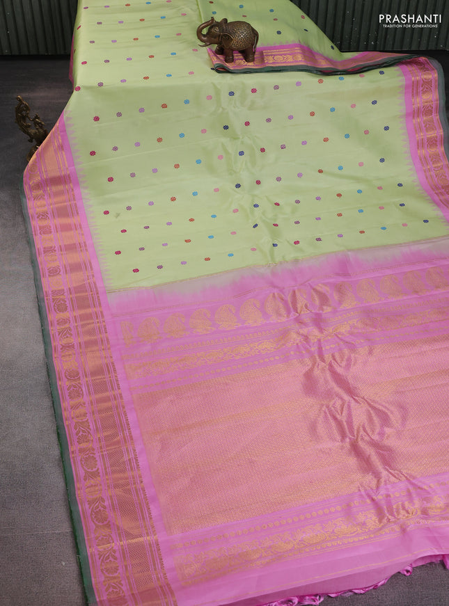 Pure gadwal silk saree pista green and light pink with thread woven buttas and temple design zari woven border