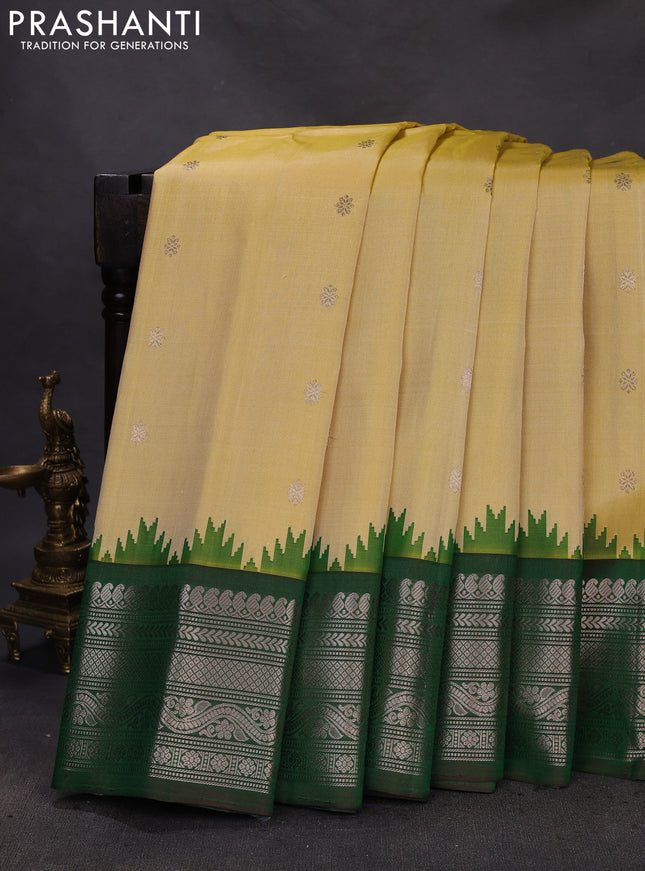 Pure gadwal silk saree pale yellow and dual shade of green with zari woven buttas and temple design zari woven border
