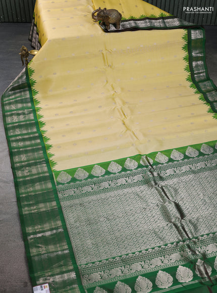 Pure gadwal silk saree pale yellow and dual shade of green with zari woven buttas and temple design zari woven border