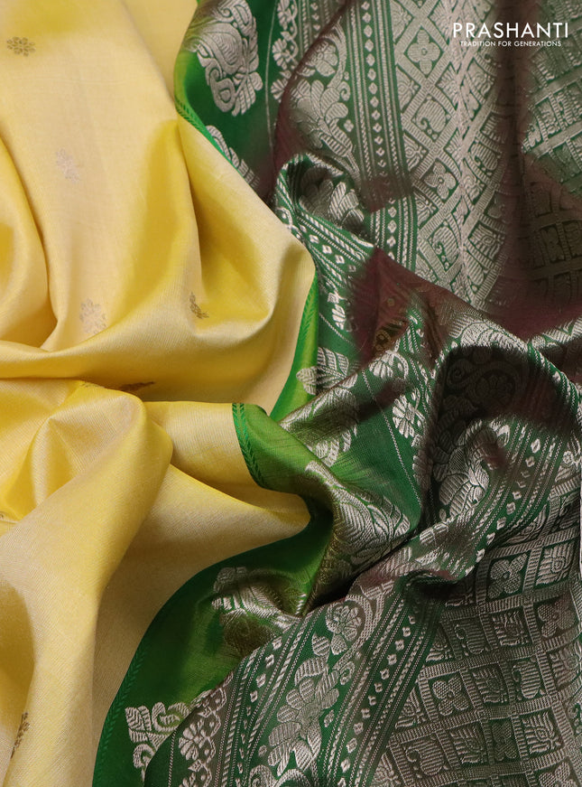 Pure gadwal silk saree pale yellow and dual shade of green with zari woven buttas and temple design zari woven border