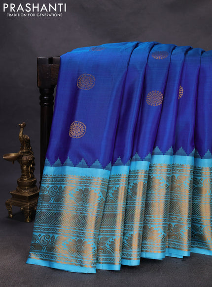 Pure gadwal silk saree blue and teal blue with zari woven buttas and temple design zari woven border