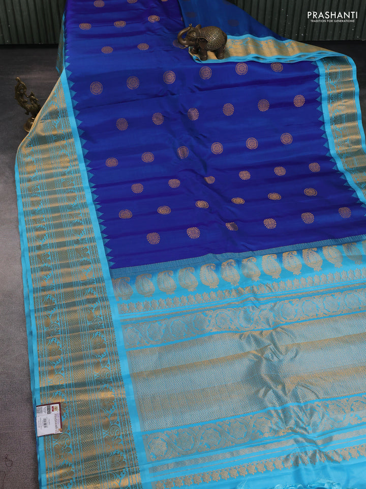Pure gadwal silk saree blue and teal blue with zari woven buttas and temple design zari woven border