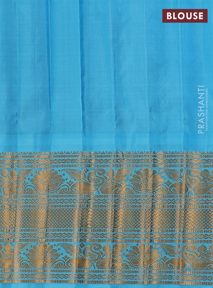Pure gadwal silk saree blue and teal blue with zari woven buttas and temple design zari woven border