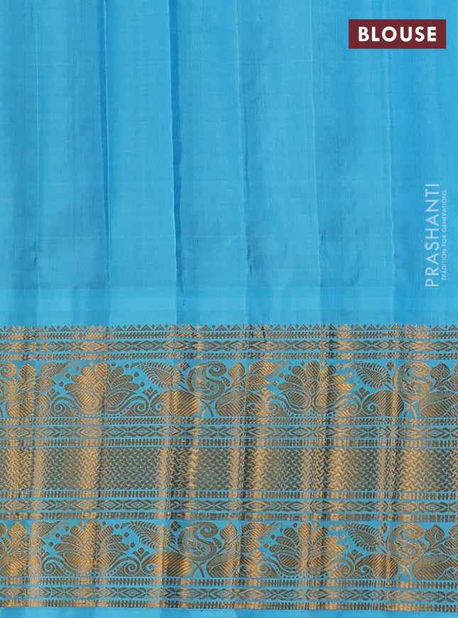 Pure gadwal silk saree blue and teal blue with zari woven buttas and temple design zari woven border