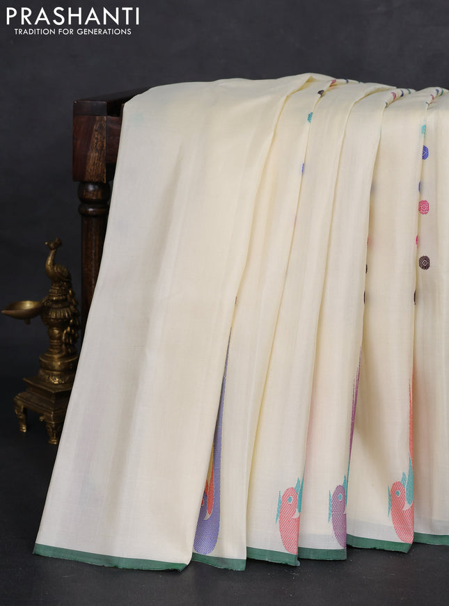 Pure gadwal silk saree cream and purple with allover thread woven buttas and thread woven muniya butta border