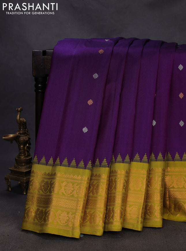 Pure gadwal silk saree purple and lime green with silver & gold zari woven buttas and temple design zari woven border