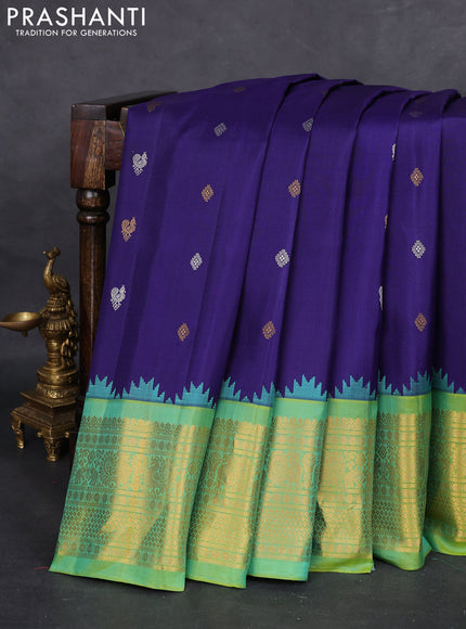 Pure gadwal silk saree blue and dual shade of green with silver & gold zari woven buttas and temple design zari woven border