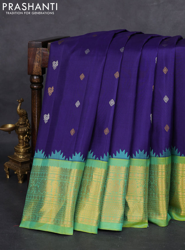 Pure gadwal silk saree blue and dual shade of green with silver & gold zari woven buttas and temple design zari woven border
