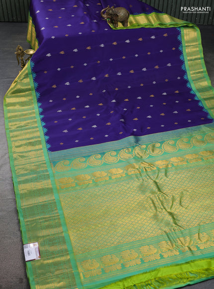 Pure gadwal silk saree blue and dual shade of green with silver & gold zari woven buttas and temple design zari woven border