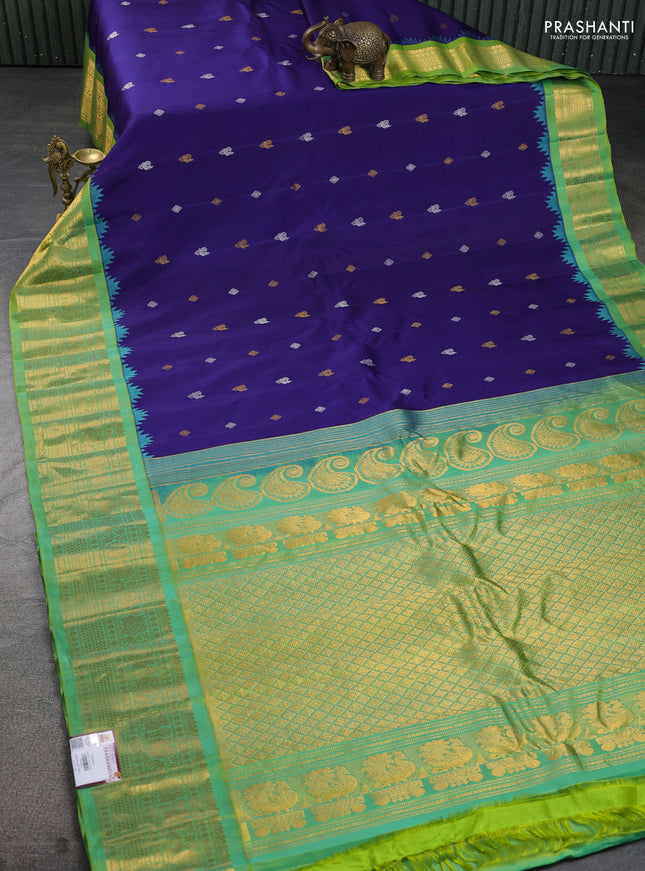 Pure gadwal silk saree blue and dual shade of green with silver & gold zari woven buttas and temple design zari woven border
