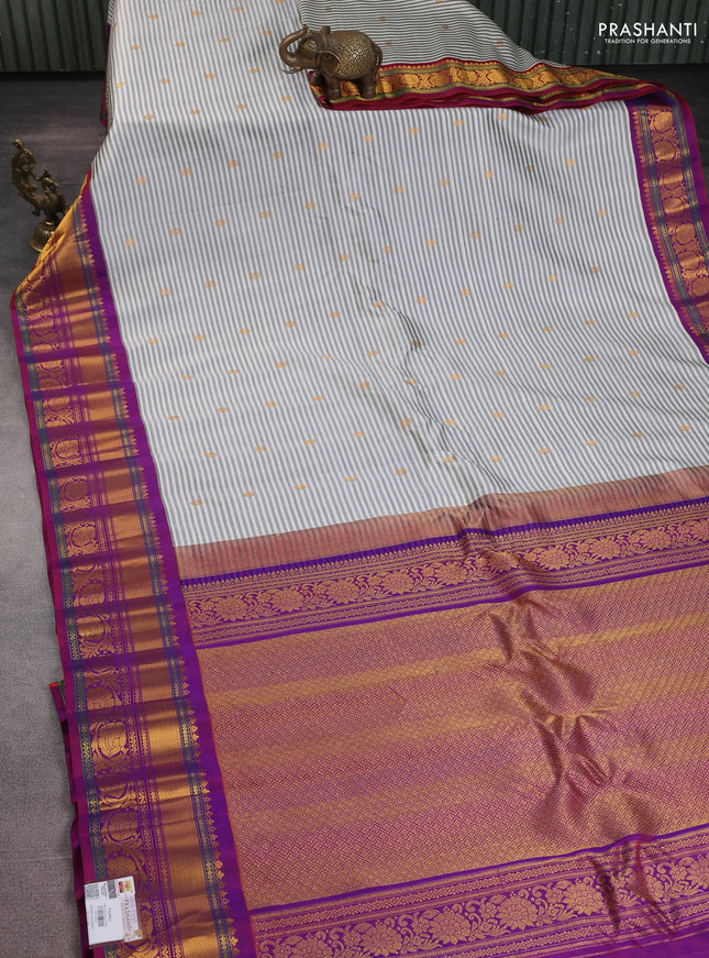Pure gadwal silk saree off white wine shade and purple with allover stripe pattern & zari buttas and rich zari woven border