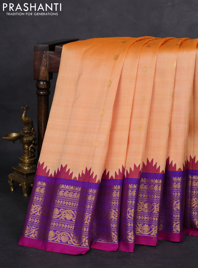 Pure gadwal silk saree pale orange and purple with zari woven buttas and temple design zari woven border
