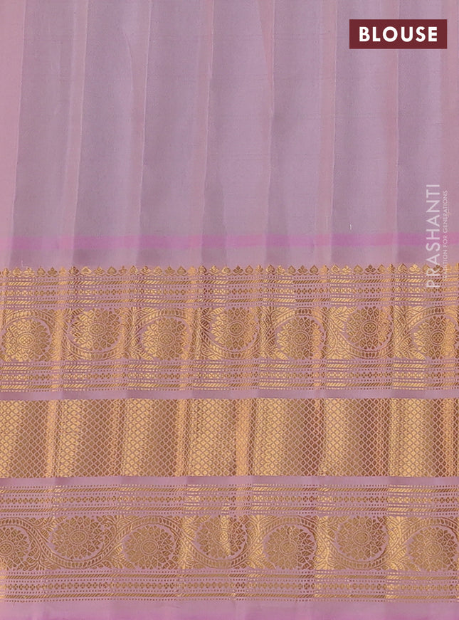 Pure gadwal silk saree teal green and mild peach pink with allover checks & zari buttas and long zari woven border