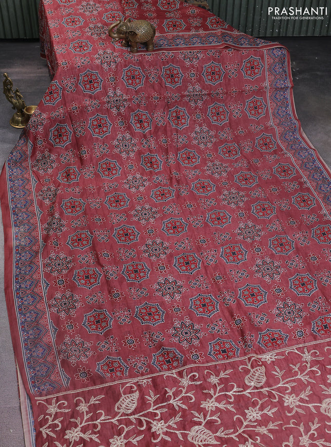 Semi chanderi saree maroon with allover ajrakh prints and embroidery pallu