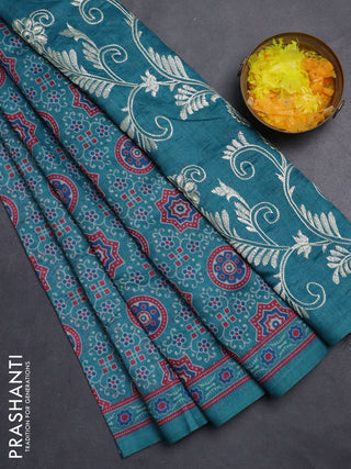 Semi chanderi saree teal green with allover prints and embroidery pallu