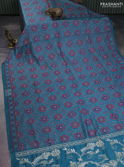 Semi chanderi saree teal green with allover prints and embroidery pallu