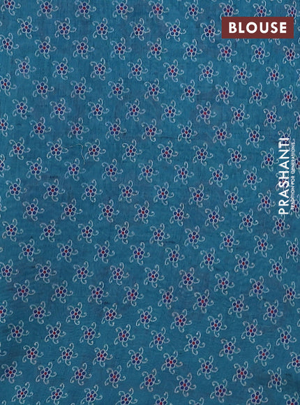 Semi chanderi saree teal green with allover prints and embroidery pallu