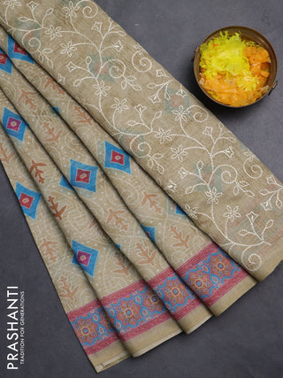Semi chanderi saree pista green with allover prints and embroidery pallu