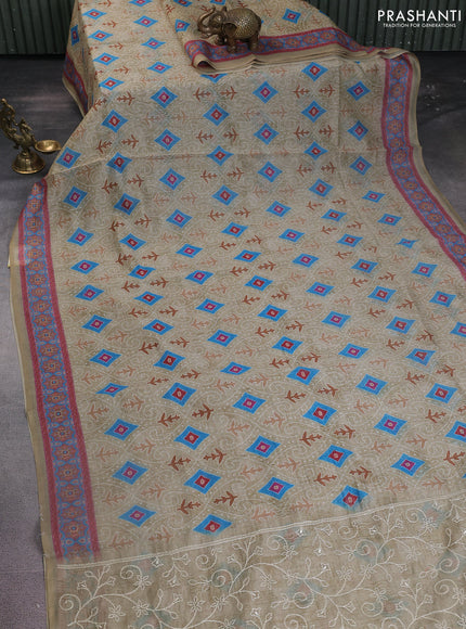 Semi chanderi saree pista green with allover prints and embroidery pallu