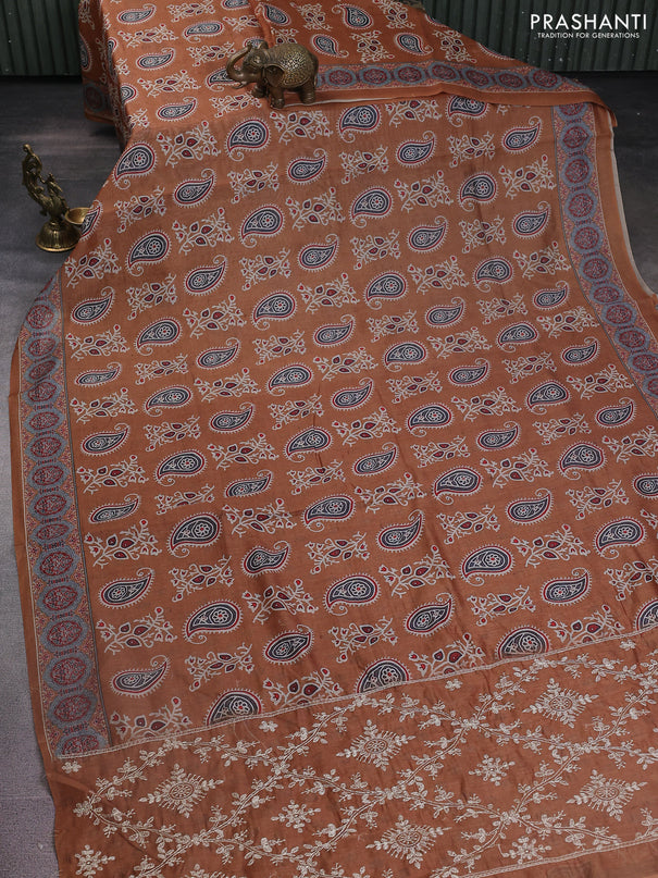 Semi chanderi saree dark mustard with allover prints and embroidery pallu