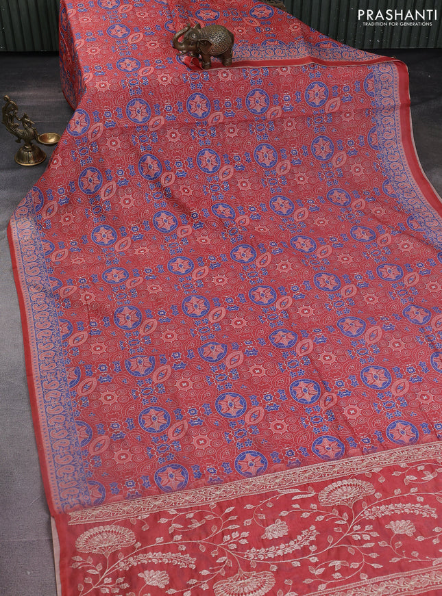 Semi chanderi saree peach orange with allover ajrakh prints and embroidery pallu
