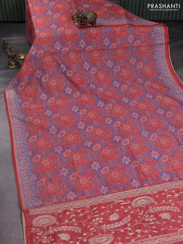 Semi chanderi saree peach orange with allover ajrakh prints and embroidery pallu
