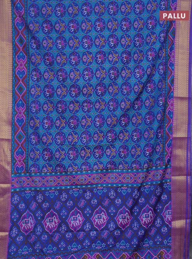 Semi tussar saree teal green and purple with allover ikat prints and zari woven border