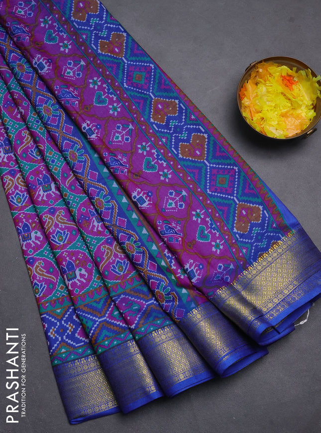 Semi tussar saree teal green and blue with allover ikat prints and zari woven border