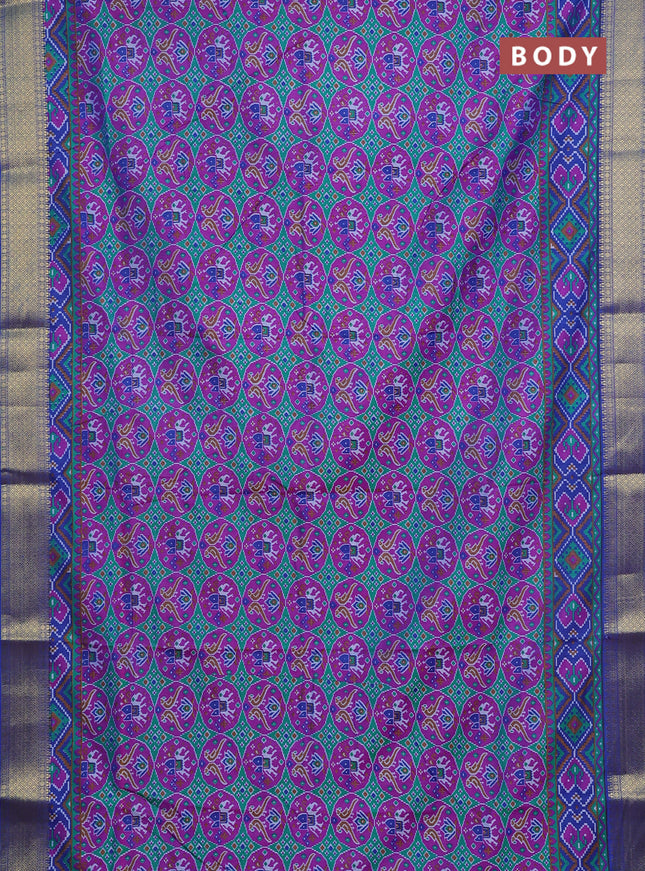 Semi tussar saree teal green and blue with allover ikat prints and zari woven border