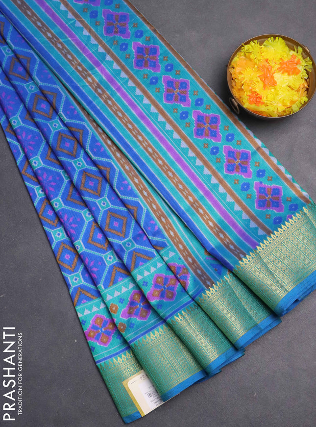 Semi tussar saree blue and teal shade with allover ikat prints and zari woven border