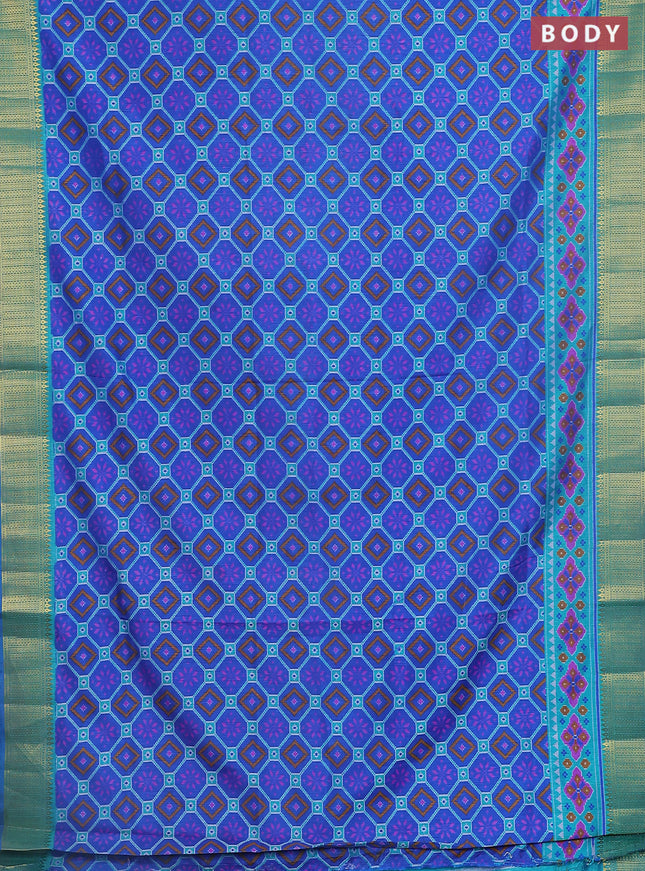 Semi tussar saree blue and teal shade with allover ikat prints and zari woven border