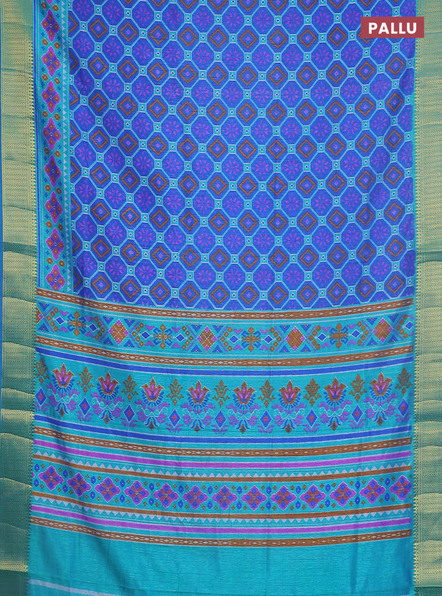 Semi tussar saree blue and teal shade with allover ikat prints and zari woven border