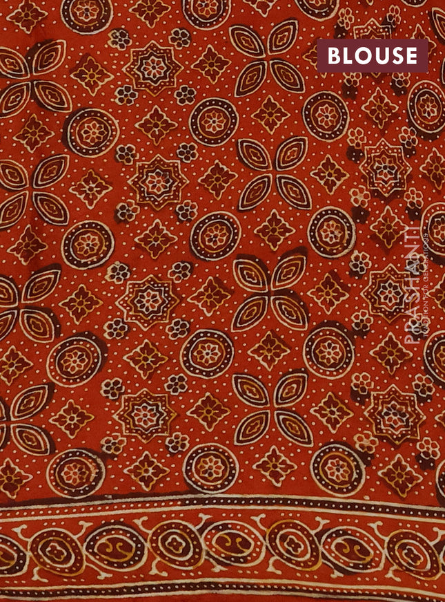 Modal silk saree peach pink and rustic orange with allover bandhani butta prints and ajrakh printed pallu & Blouse