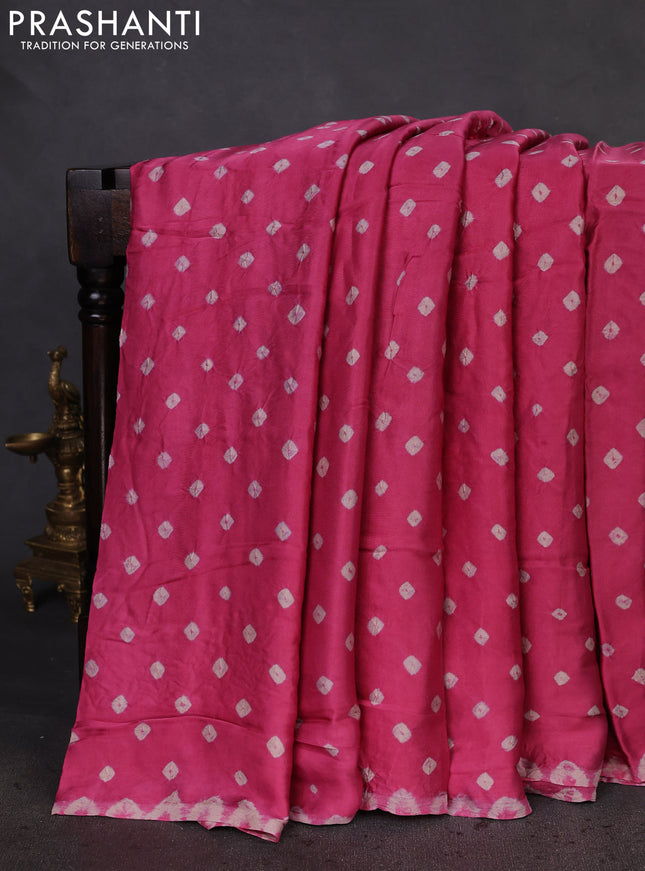 Modal silk saree peach pink and black with allover bandhani butta prints and ajrakh printed pallu & Blouse