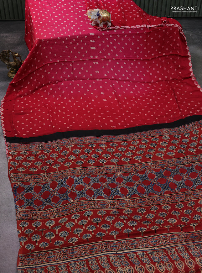 Modal silk saree pink and red with allover bandhani butta prints and ajrakh printed pallu & Blouse