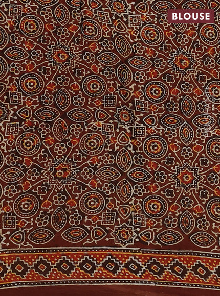 Modal silk saree peach pink and brown with allover bandhani butta prints and ajrakh printed pallu & Blouse