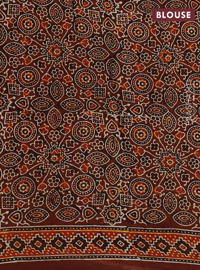 Modal silk saree peach pink and brown with allover bandhani butta prints and ajrakh printed pallu & Blouse