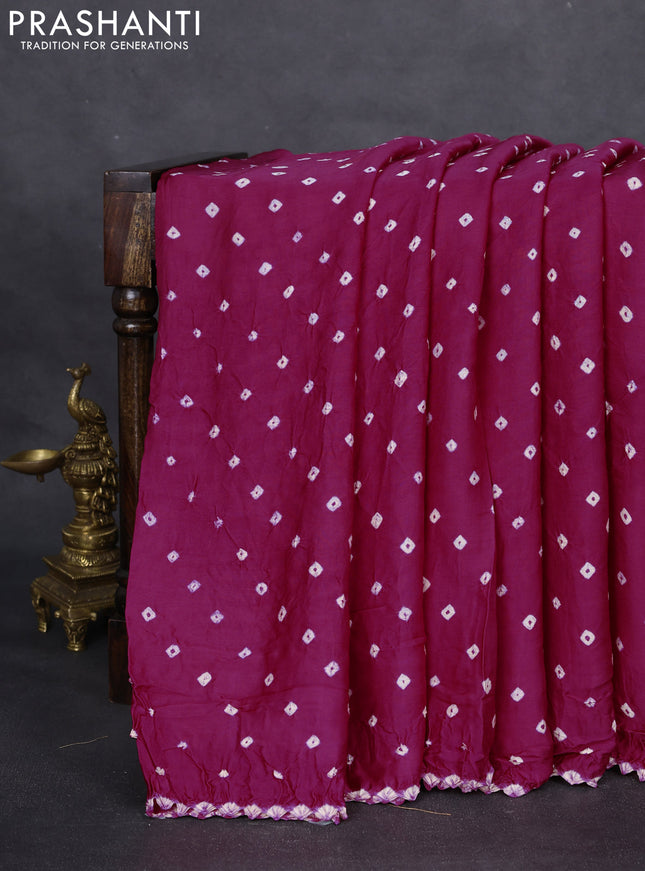 Modal silk saree pink and orange with allover bandhani butta prints and ajrakh printed pallu & Blouse