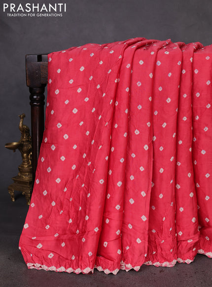 Modal silk saree peach pink and navy blue with allover bandhani butta prints and ajrakh printed pallu & Blouse