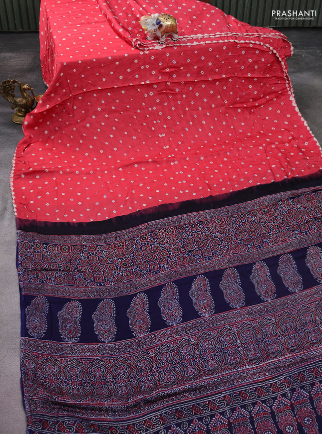 Modal silk saree peach pink and navy blue with allover bandhani butta prints and ajrakh printed pallu & Blouse