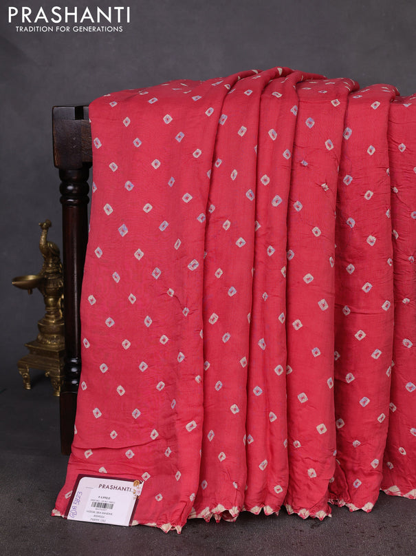 Modal silk saree peach pink and red with allover bandhani butta prints and ajrakh printed pallu & Blouse