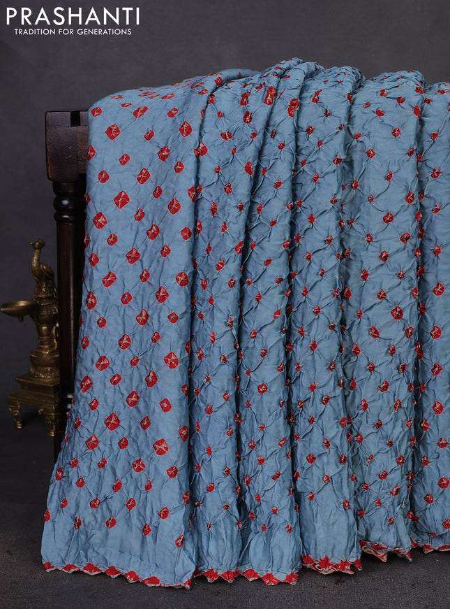 Modal silk saree pastel blue and maroon with allover bandhani butta prints and ajrakh printed pallu & Blouse
