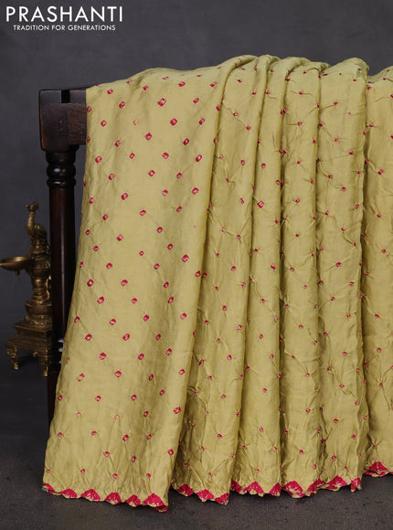 Modal silk saree pista green and black with allover bandhani butta prints and ajrakh printed pallu & Blouse