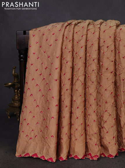 Modal silk saree sandal and black with allover bandhani butta prints and ajrakh printed pallu & Blouse