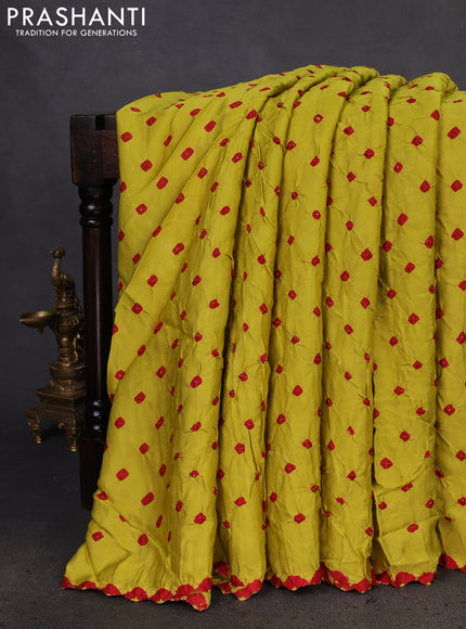 Modal silk saree lime yellow and maroon with allover bandhani butta prints and ajrakh printed pallu & Blouse