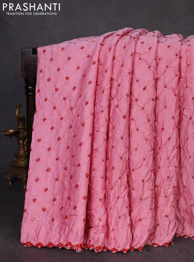 Modal silk saree peach pink and maroon with allover bandhani butta prints and ajrakh printed pallu & Blouse