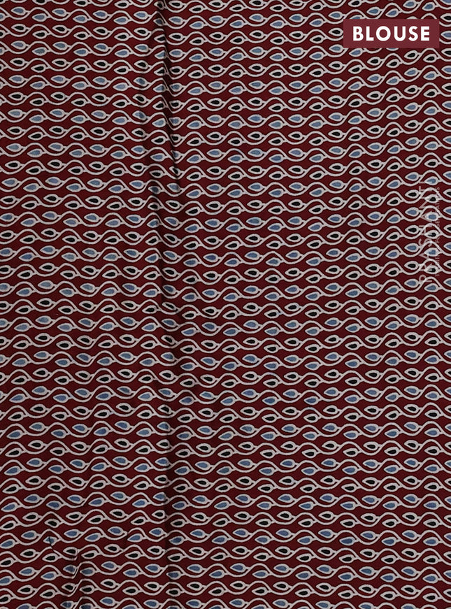 Modal silk saree pastel green and maroon with allover bandhani butta prints and ajrakh printed pallu & Blouse