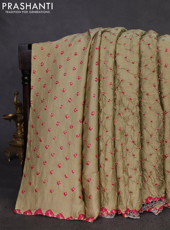 Modal silk saree pista green and black with allover bandhani butta prints and ajrakh printed pallu & Blouse