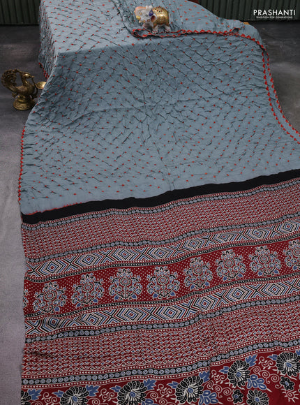 Modal silk saree pastel grey and maroon with allover bandhani butta prints and ajrakh printed pallu & Blouse