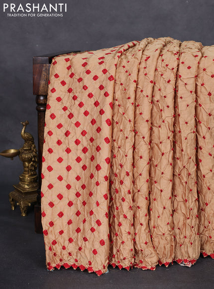 Modal silk saree sandal and maroon with allover bandhani butta prints and ajrakh printed pallu & Blouse